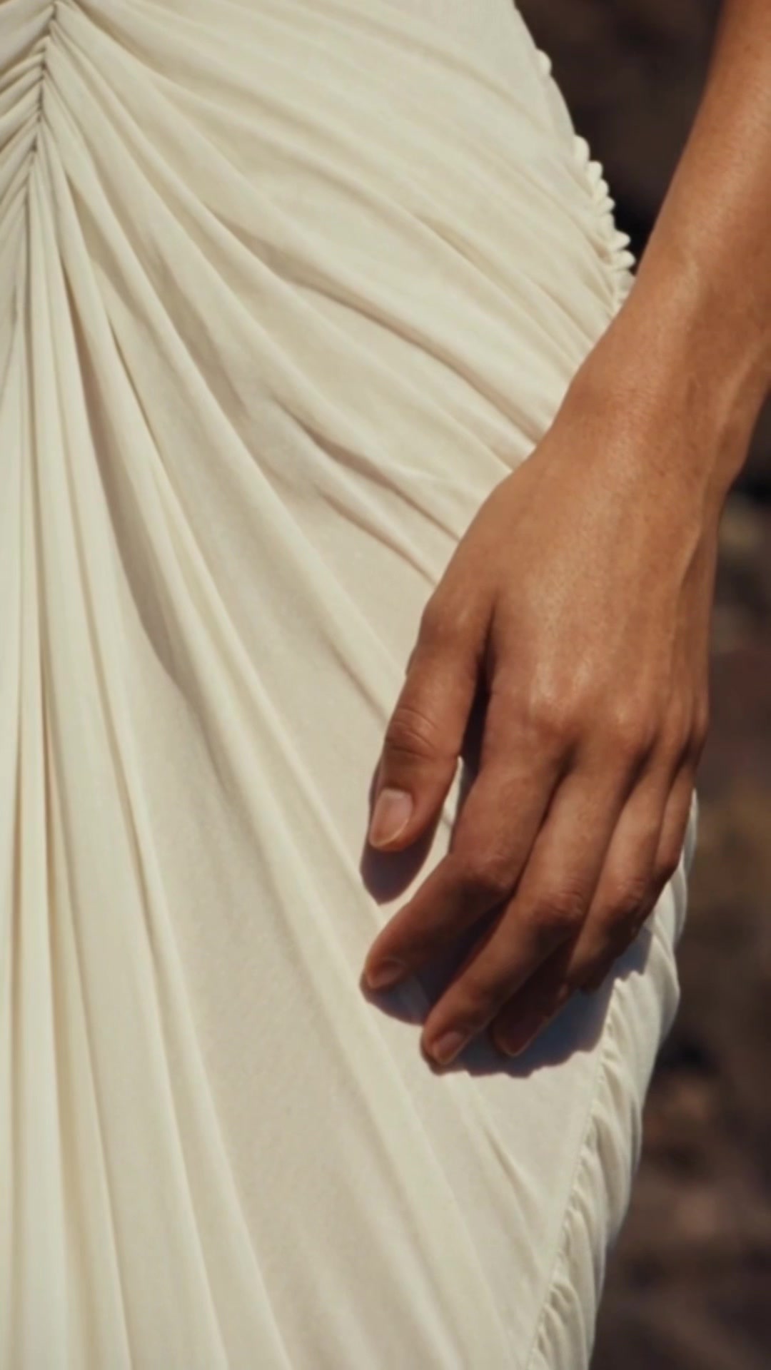 Close-up of the folds in an ivory dress
